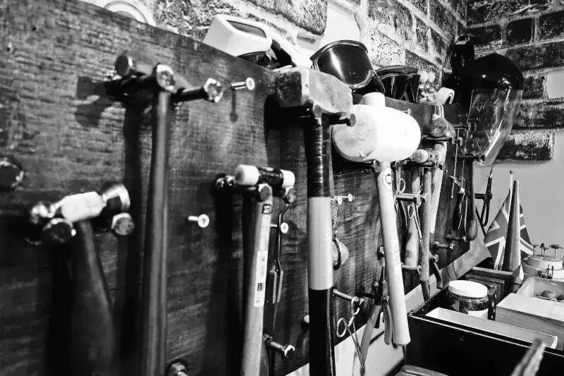 A selection of hammers used for silver repair